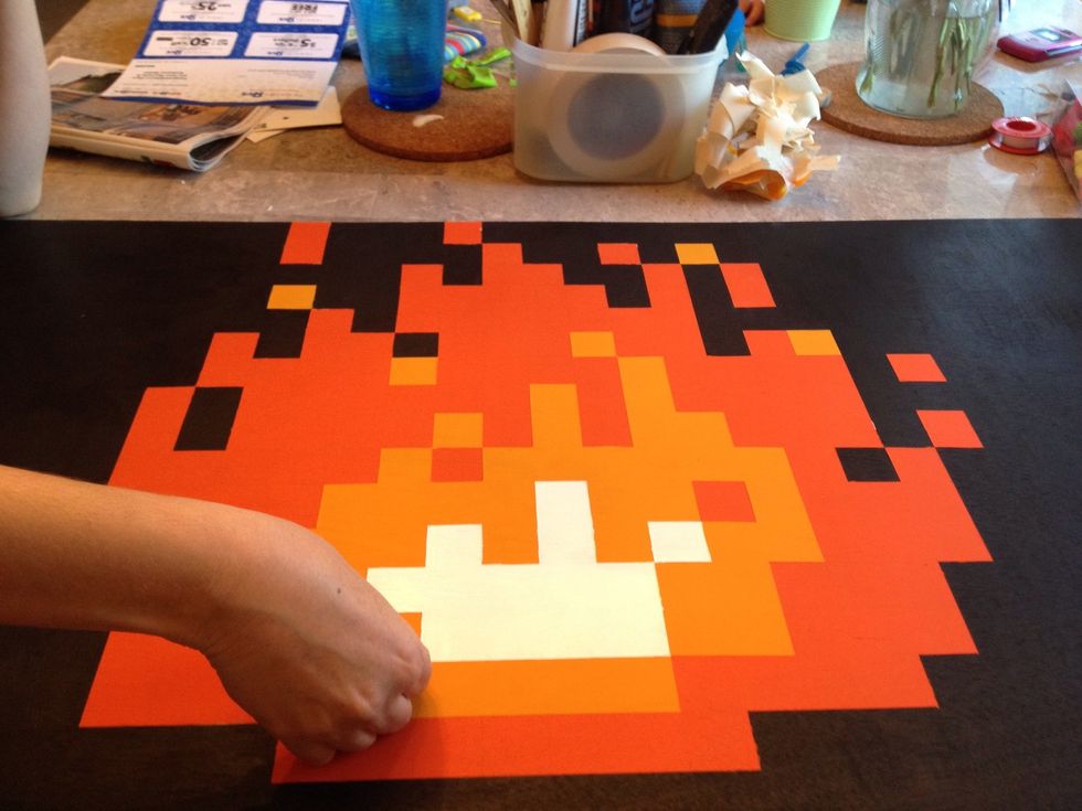 Peel the final pieces of tape, admire your work. You are very talented!