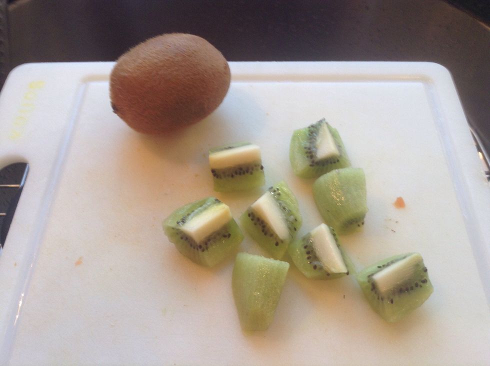 Peel the kiwi and slice them into little wedges