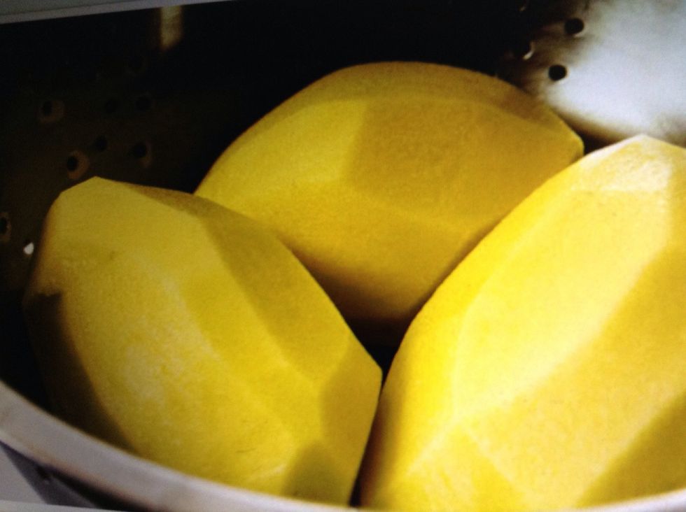 Peel the potatoes and wash with water