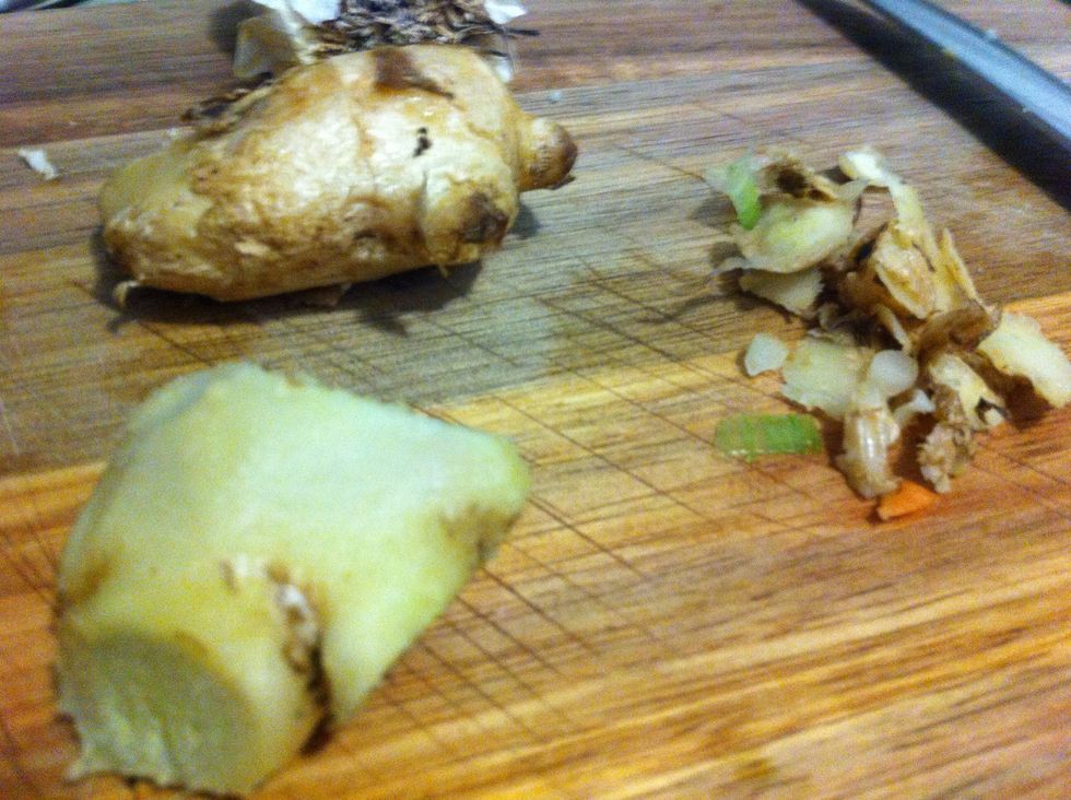 Peel the skin off of the ginger similar to peeling a potato