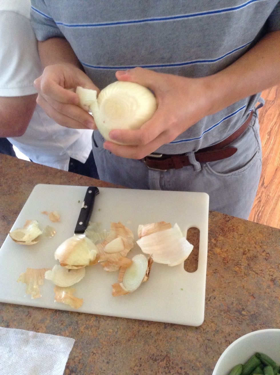 Peel the top layer off onion