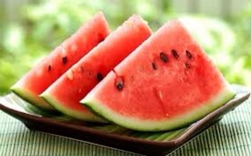 Peel the watermelon and cut those into cubes.