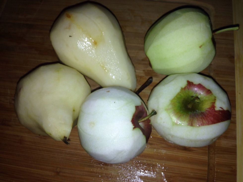 Peel up a couple different kinds of apples and a few pears.