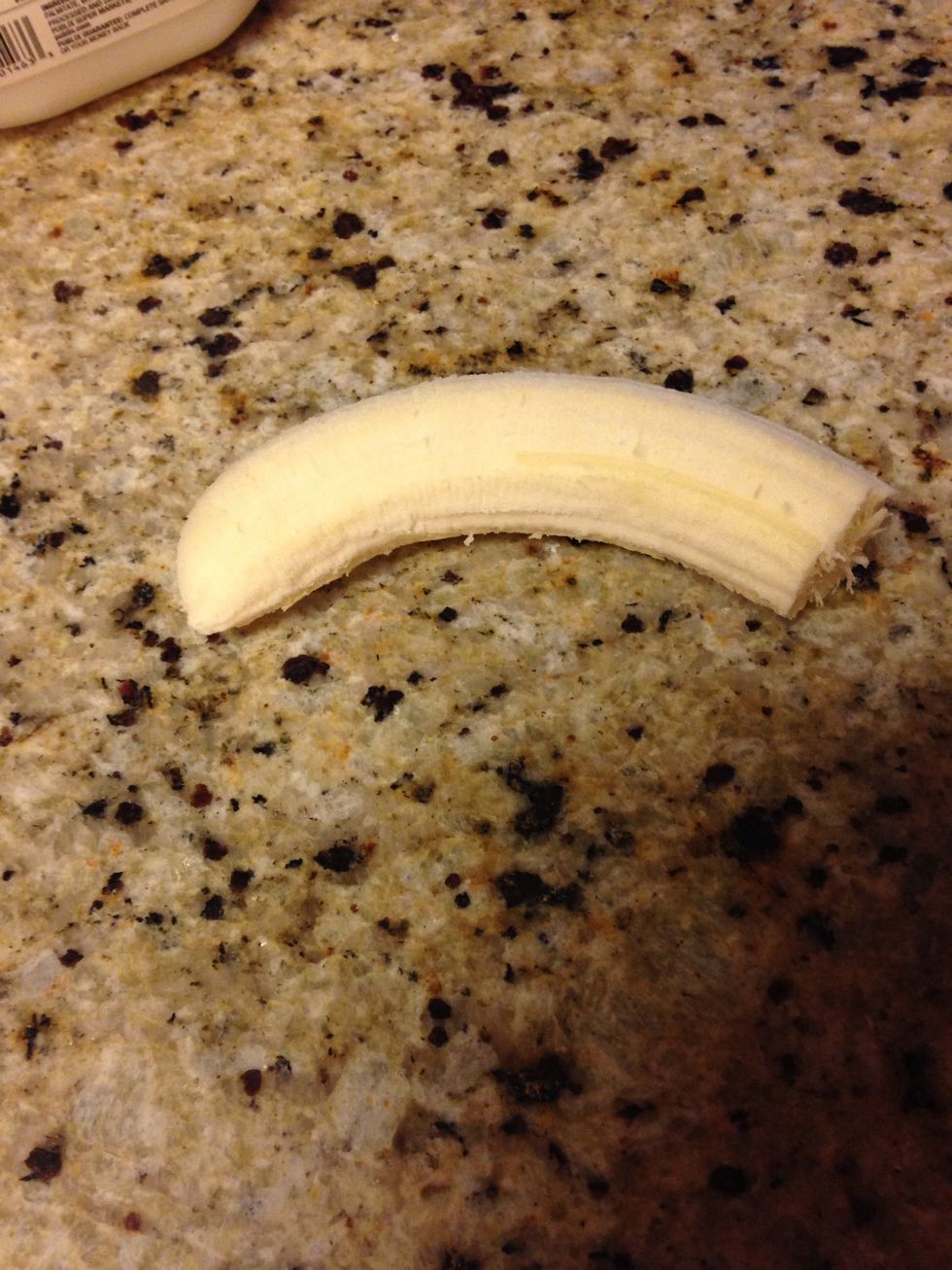 Peel your banana and put it in blender in cut up pieces