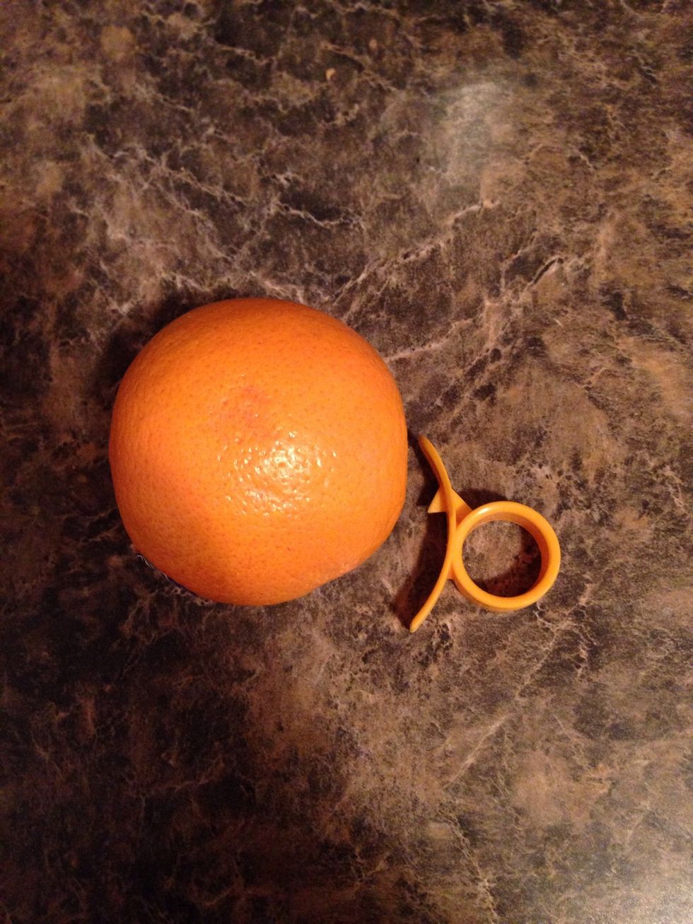 Peel your navel orange.