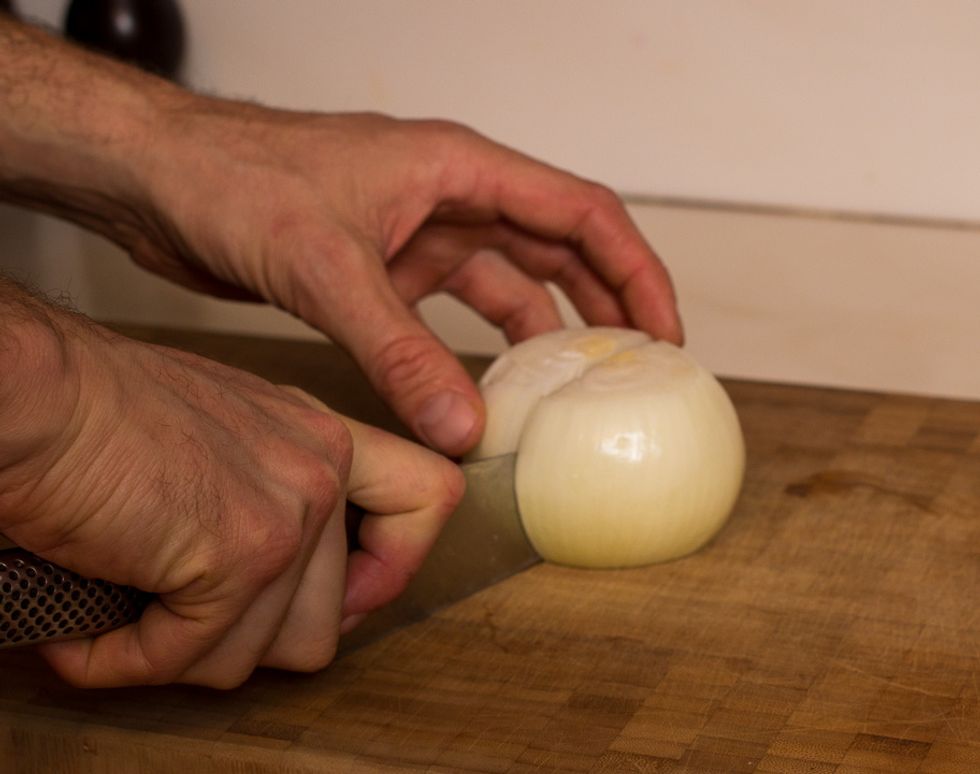Peel your onions and cut em in half
