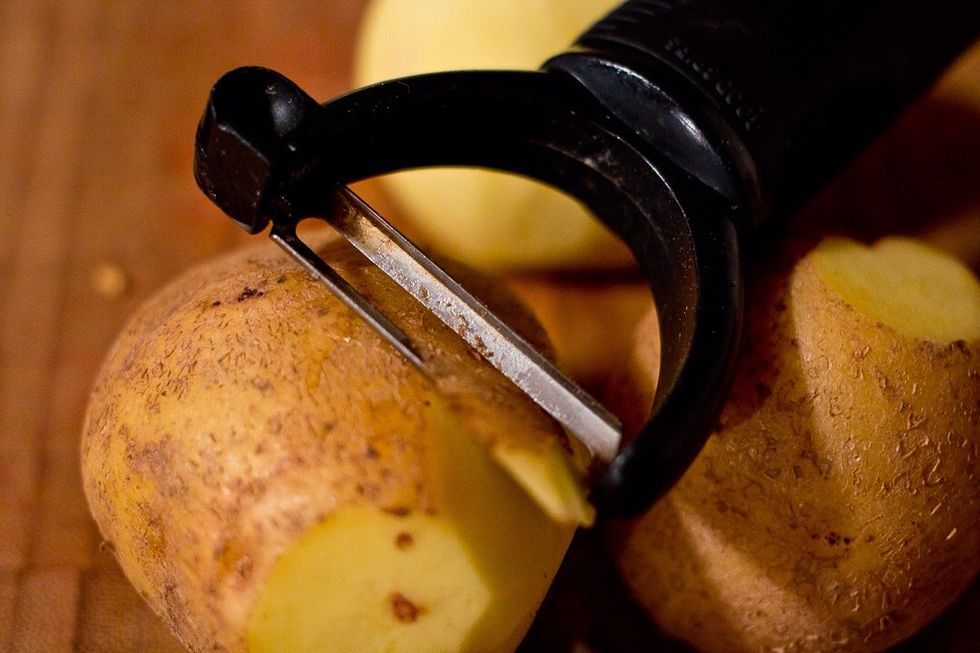 Peel your potatoes. I cut the tops and bottoms off, then peel between the slices. This method is faster then just randomly peeling around the tater.