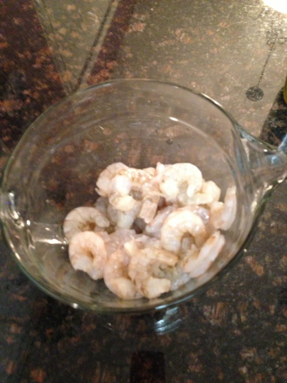Peeled & deveined raw shrimp in mixing bowl.