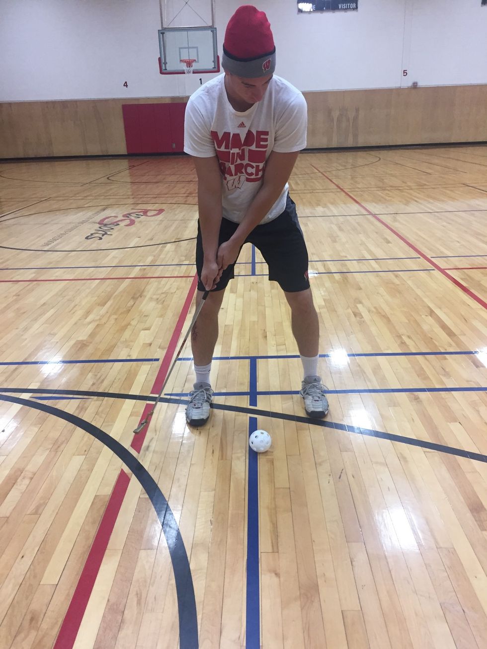 Pendulum swing, short backswing, keep blade square to hole or target line