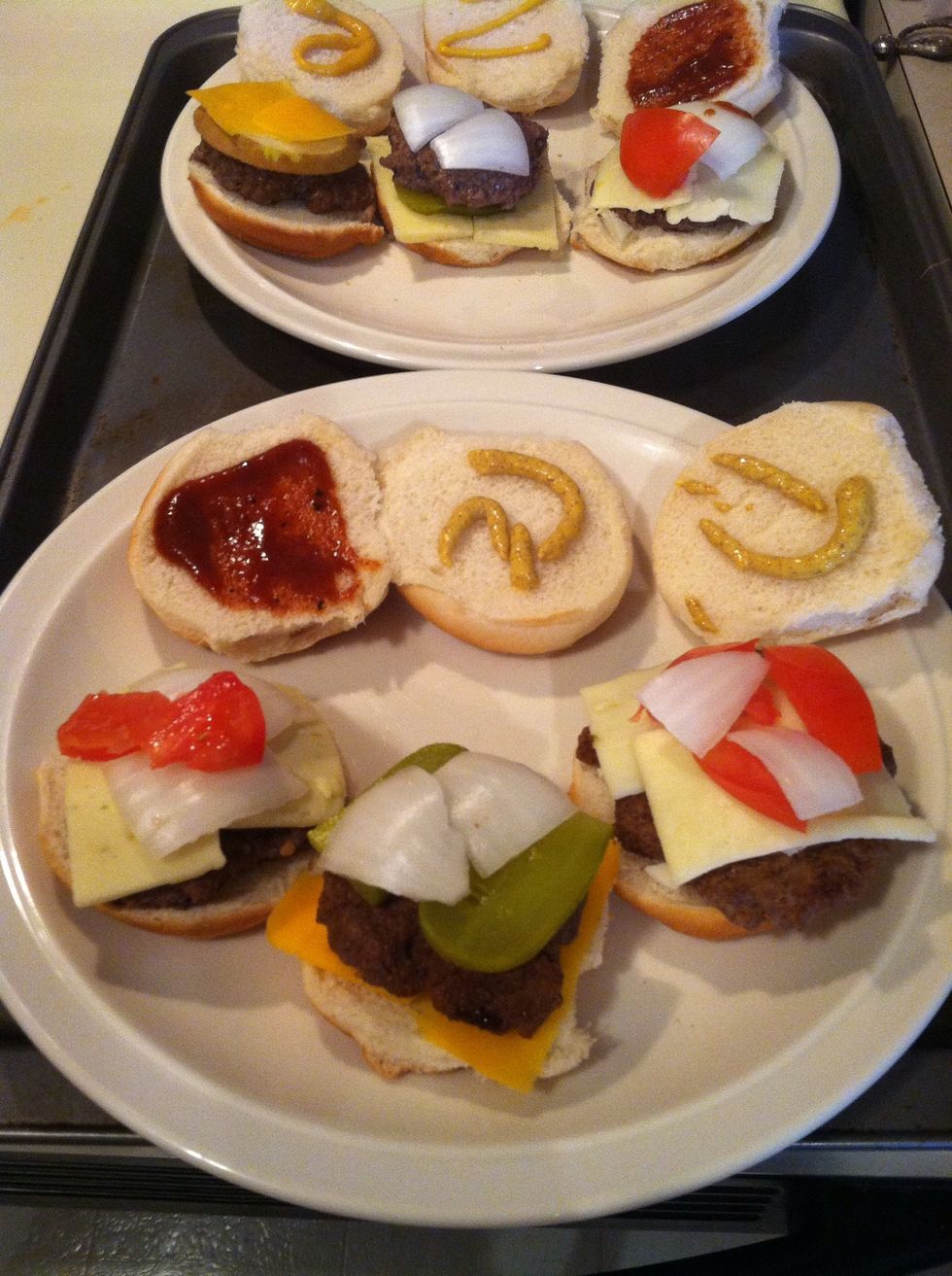 Pepperjack burger - pepperjack, onion, tomato, BBQ sauce; BBQ sauce burger - cheddar, dill pickle, onion, spicy mustard; spicy mustard burger - mozzarella, tomato, onion, spicy mustard.