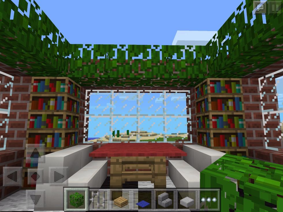 Perhaps some bookshelves near the table? All full of your cookery books and recipes!