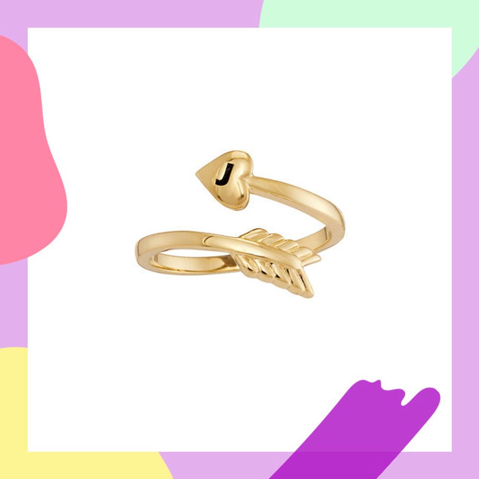 Personalized 14K Yellow Gold Bypass Arrow Initial Ring ($449.99): This gold arrow ring is a piece she can wear with any outfit whether she\u2019s heading to work or out to dinner.
