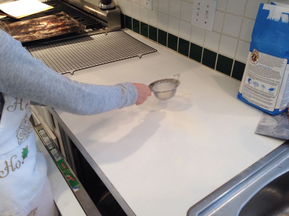 Phew ! Hildegard is back! And she's covering the counter with flour. See how she has the dishwasher open?