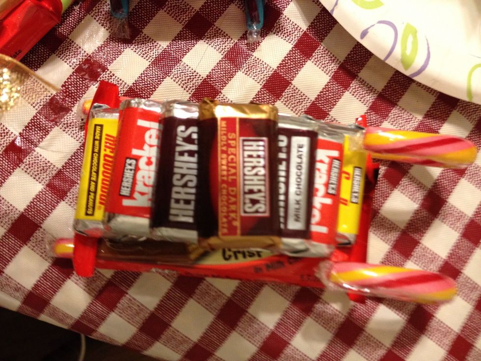 Pick 1 mini bars hot glue them on top of the other mini bars