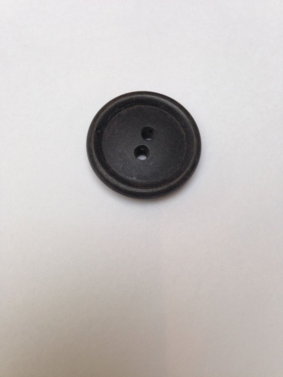 Pick a bigger button for the base- this is about 1" diameter