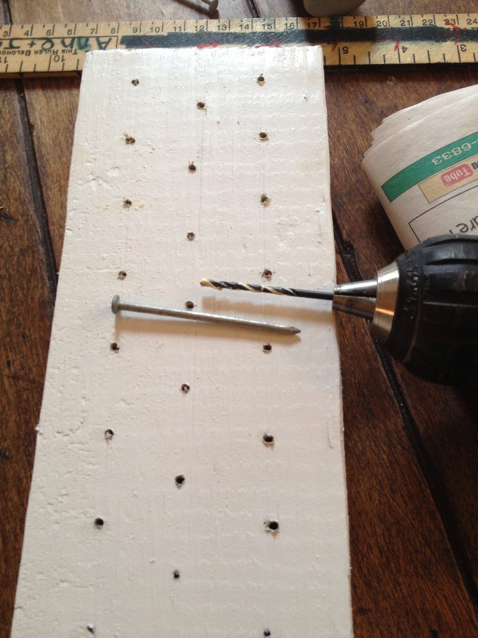 Pick a drill bit that corresponds to your nail. Pre-drill all of your holes. Do not drill all the way through your board.