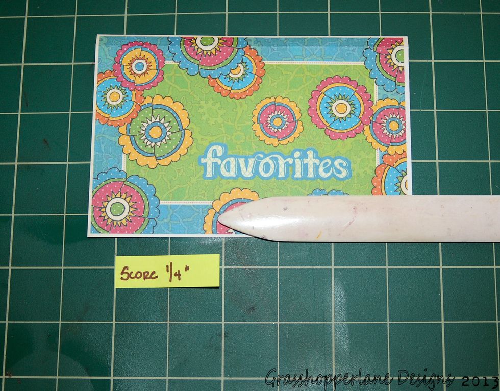 Pick a journal card from the collection. Score the top edge at 1/4". This will make our photo flip.