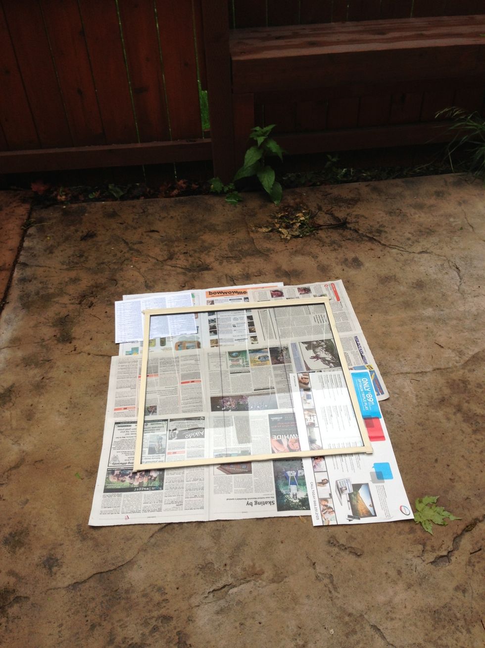 Pick a nice place to spray paint the back side of the window. This side will be against the wall and you will write on the untainted glass.