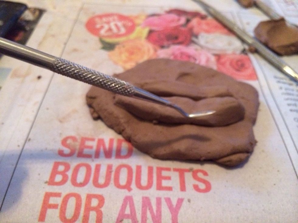 Pick a sculpting tool that you feel comfortable using that will allow you to get into small areas.