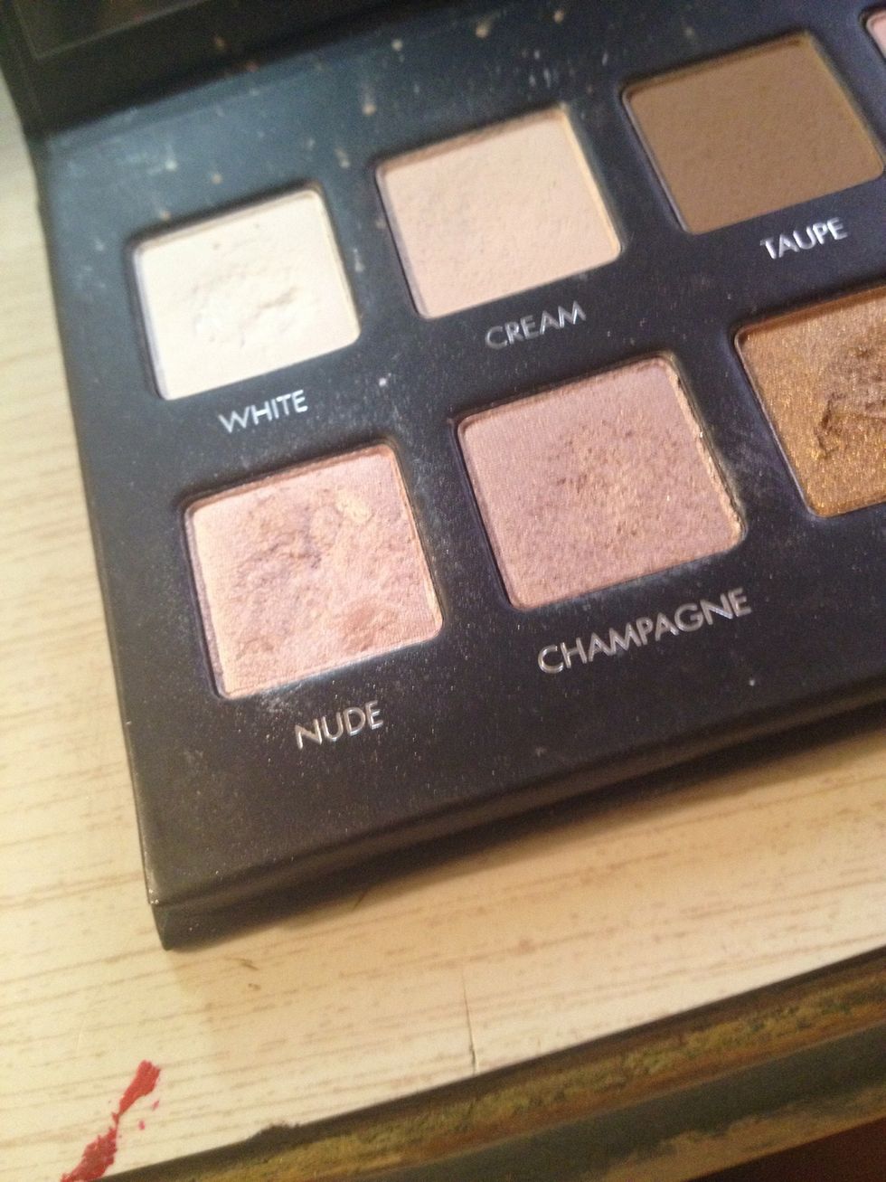 Pick a shimmery peachy tone for your lid