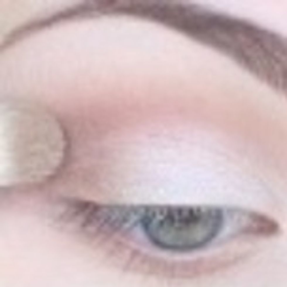 Pick a warmer color, such as a light brown or tan. Put that color around the crease of your eye. Make sure to use a faint amount.