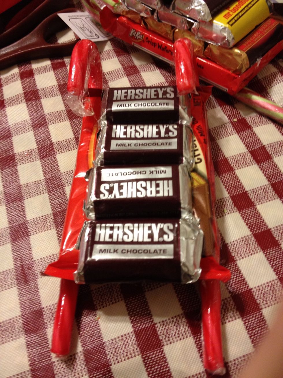 Pick any four mini hershey bars hot glue them on kitkat