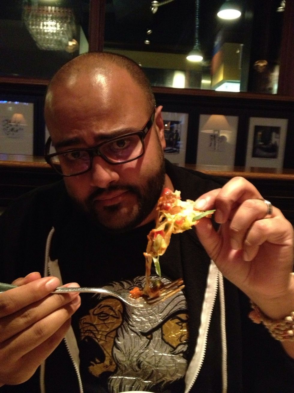 Pick out a nacho or 2. Make sure there is a good amount of cheese, sauce etc on it.