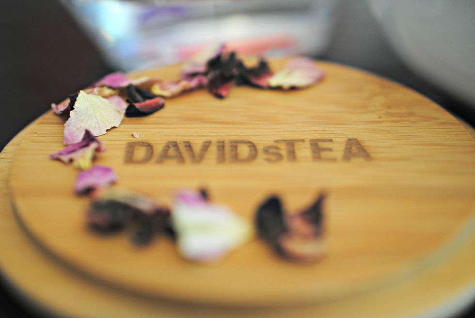 Pick out some rose petals from the DAVIDsTEA Sweet Dreams herbal infusion and set aside.