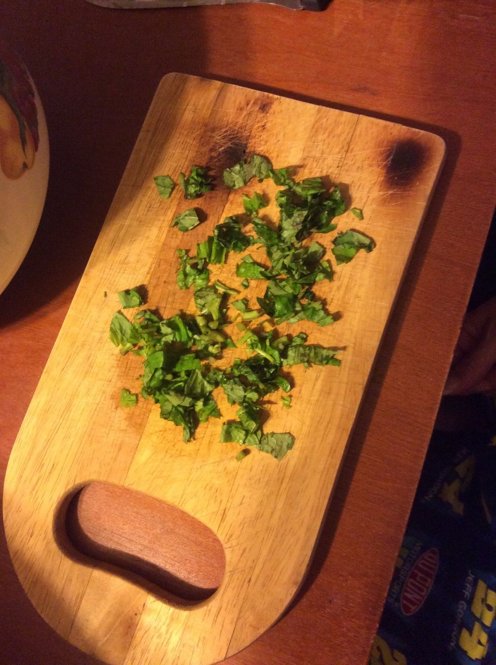 Pick the basil leaves and finely slice the stalks.