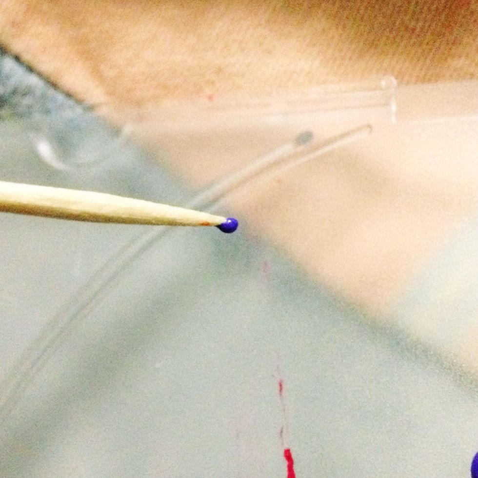 pick up a little bit of paint on your toothpick.