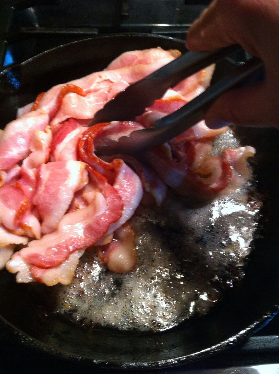 Pick up bacon and check for browning.