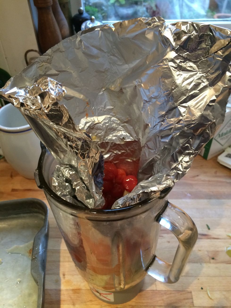 Pick up the foil and carefully dump it all into the blender. Easy! Now add any leftover roast veg you want in the sauce, carrot is quite good, I just added my roast garlic.