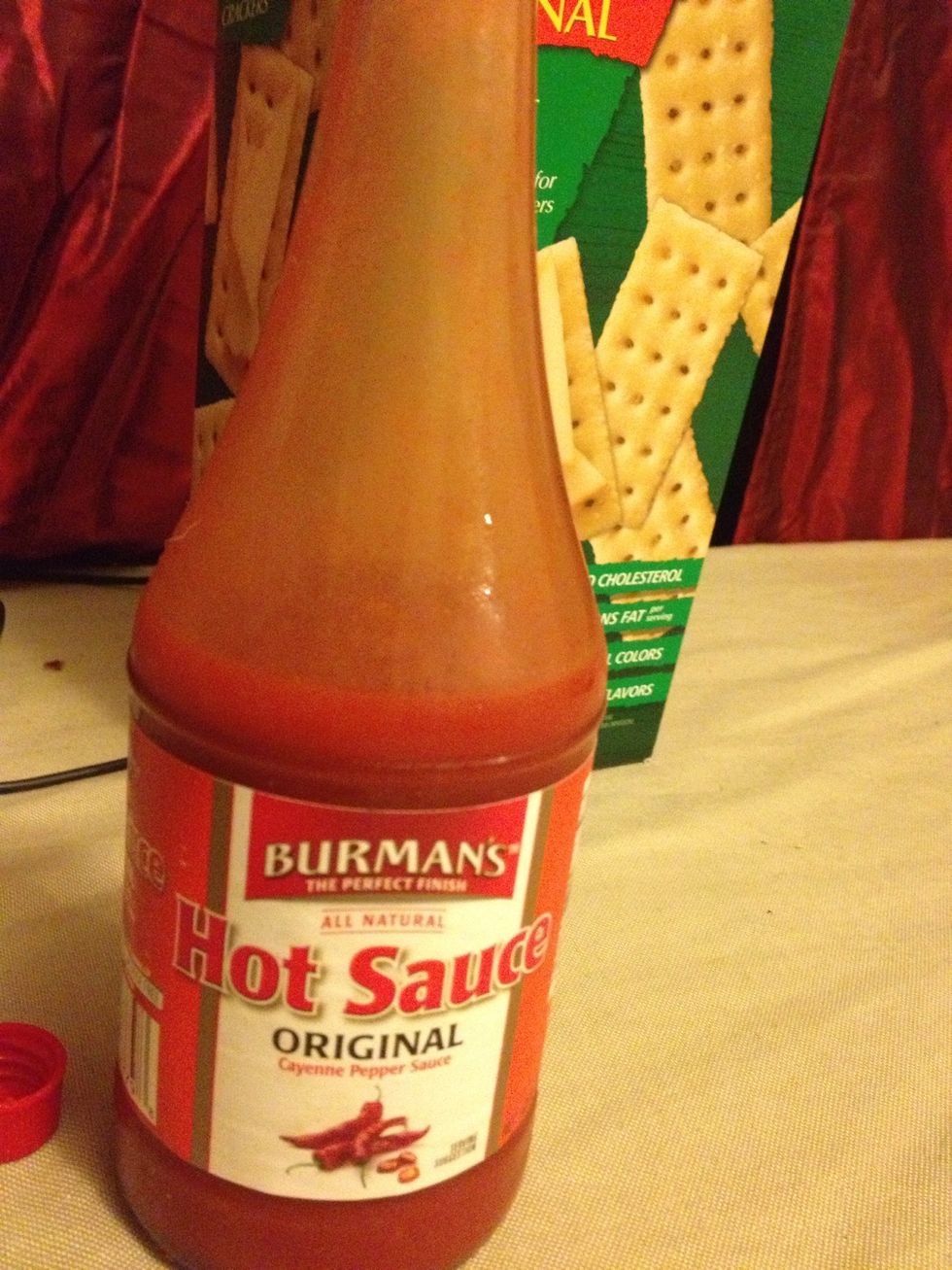 Pick your favorite hot sauce and drizzle on top of the oyster and cracker.