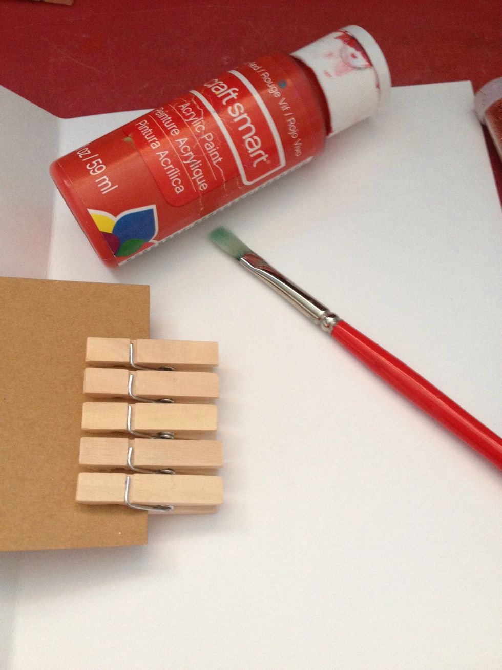 Pick your first color and paint one clothes pin to test how sticky the paint is etc.