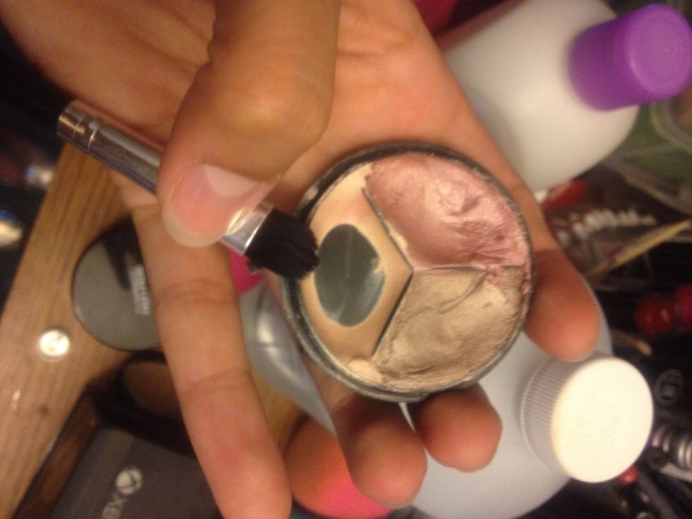 Pick your highlight. This is actually a cream shadow by AVON. I'm using the light champagne color.