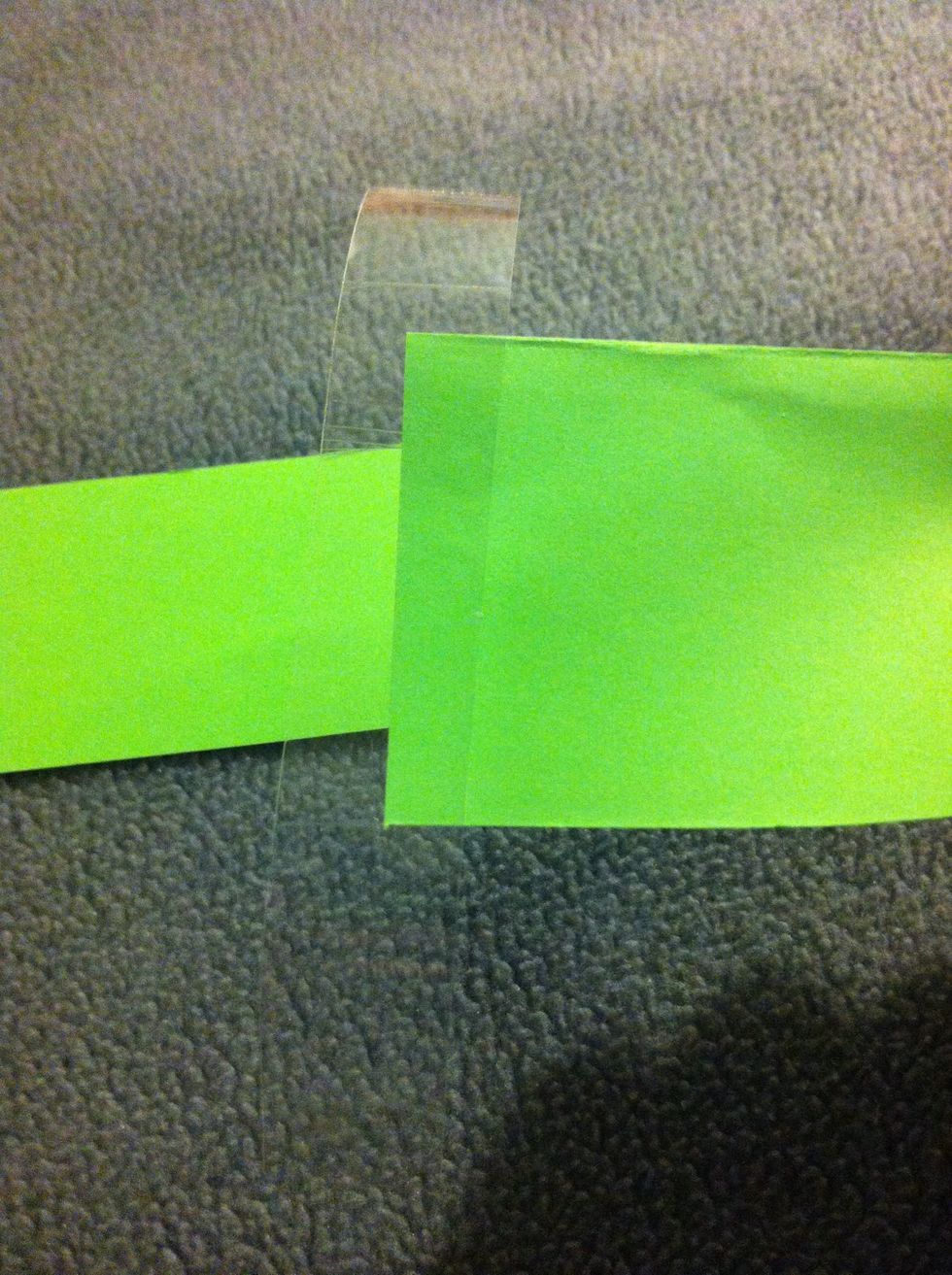 Piece of sticky tape (make sure it's at least as long as double the width of the paper) at the end of one strip.