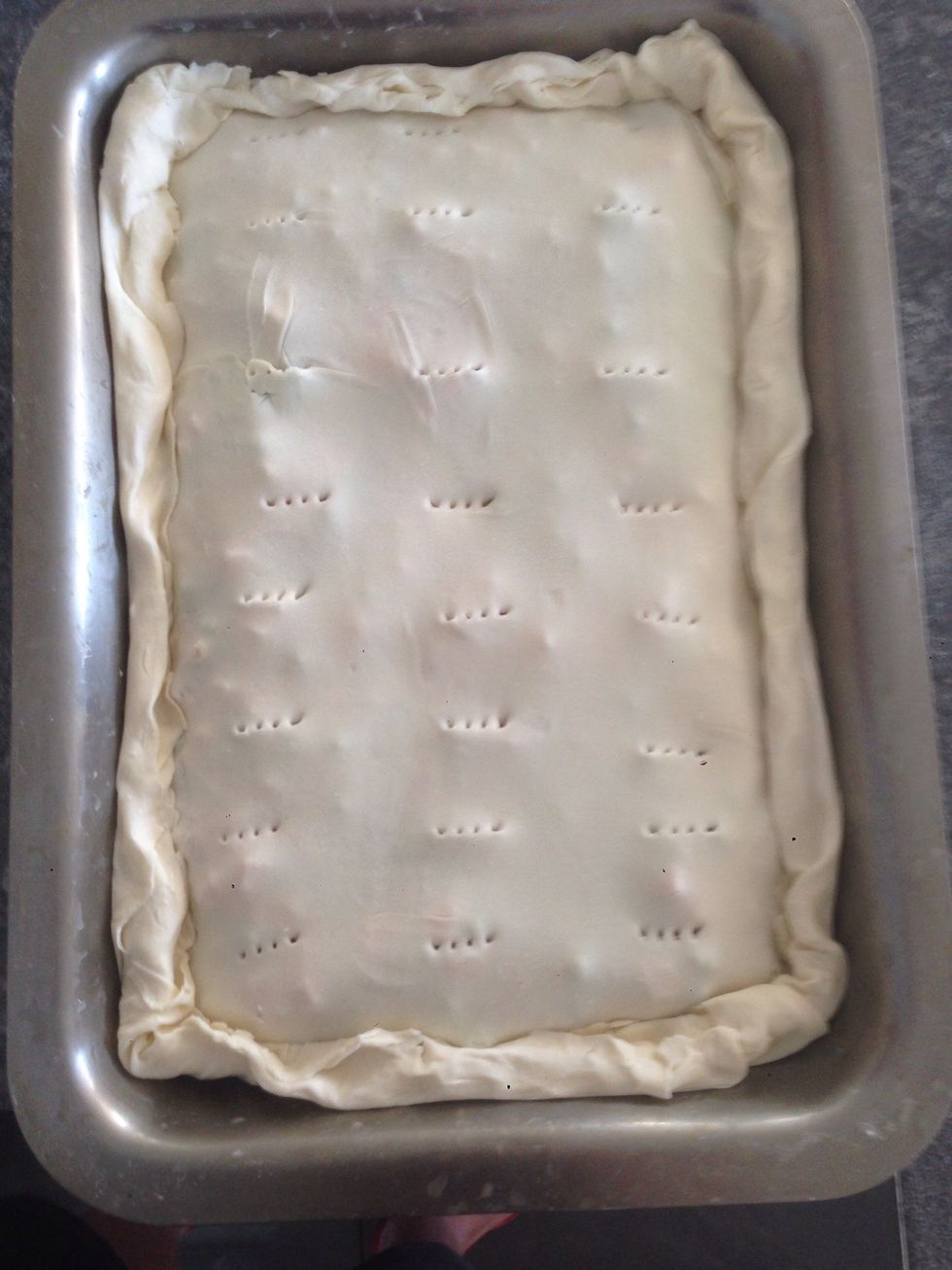 Pierce top gently with fork, then bake at 180deg C for 30-40 min. Keep an eye on it while cooking. If some of your ingredients are moist like the tomatoes and mixed vege, Cook closer to the 40min mark