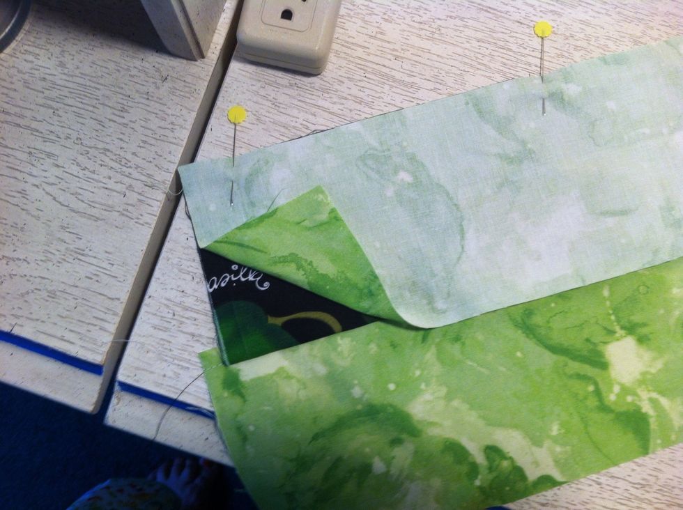 Pin and sew strips. Use 1/4" seam (usually the width of the presser foot). Make one set by stitching one light strip to one dark strip, add a third strip to create one light-dark-light and one D-L-D.