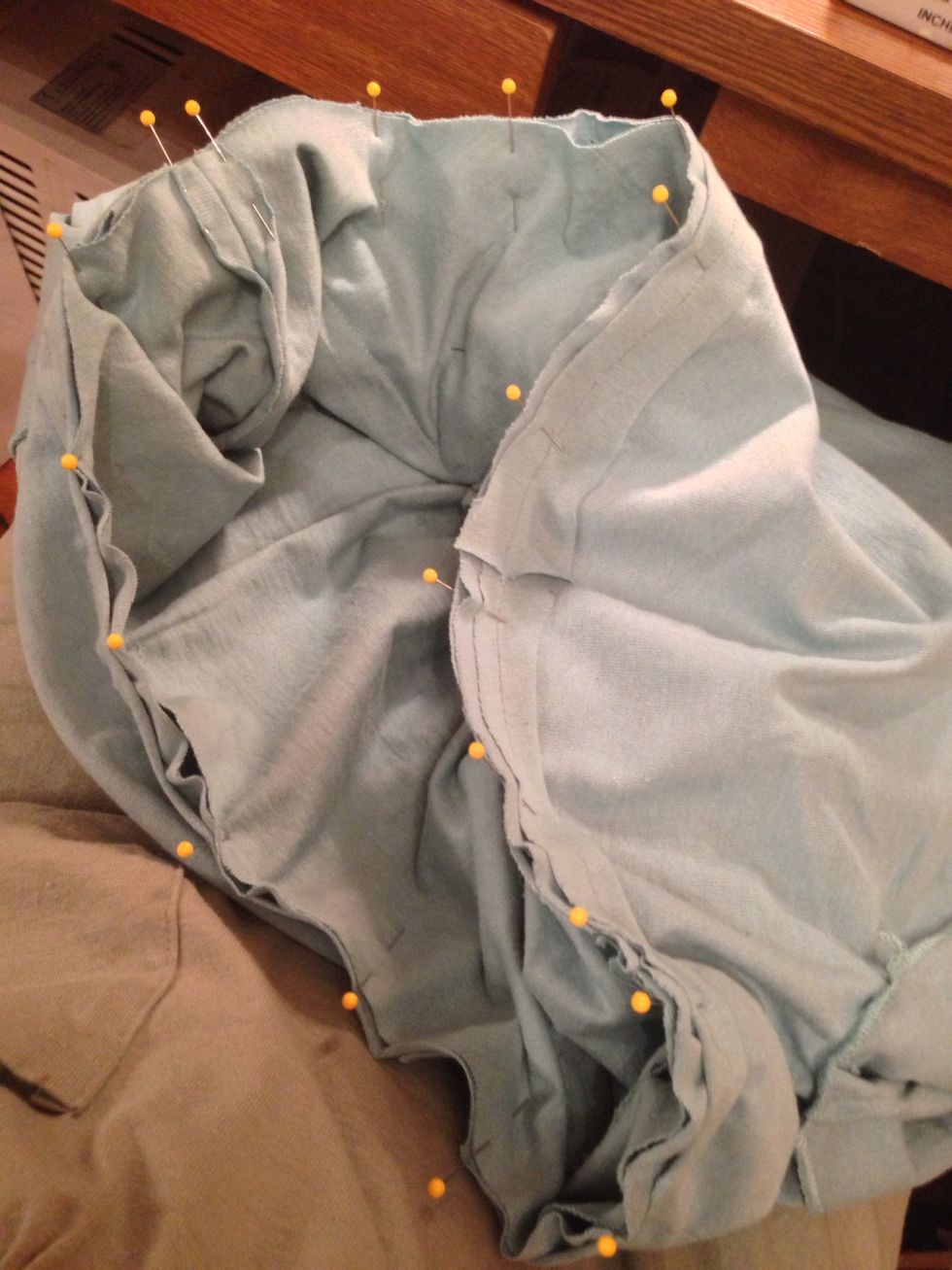 Pin and stitch with a straight stitch. Stretch only enough to prevent gathers.
