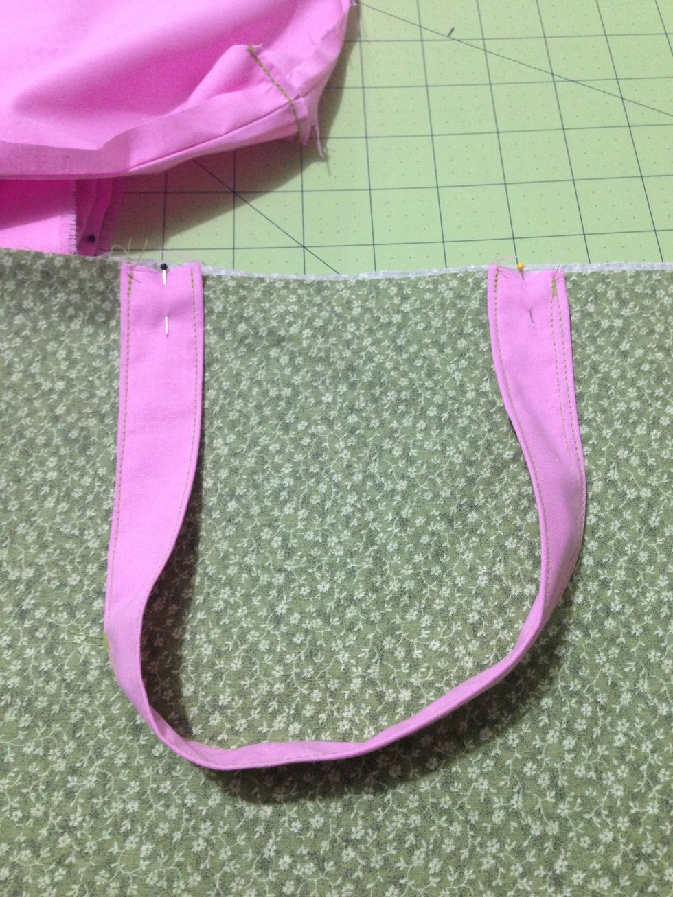 Pin handles at marks making sure the handle isn't twisted.