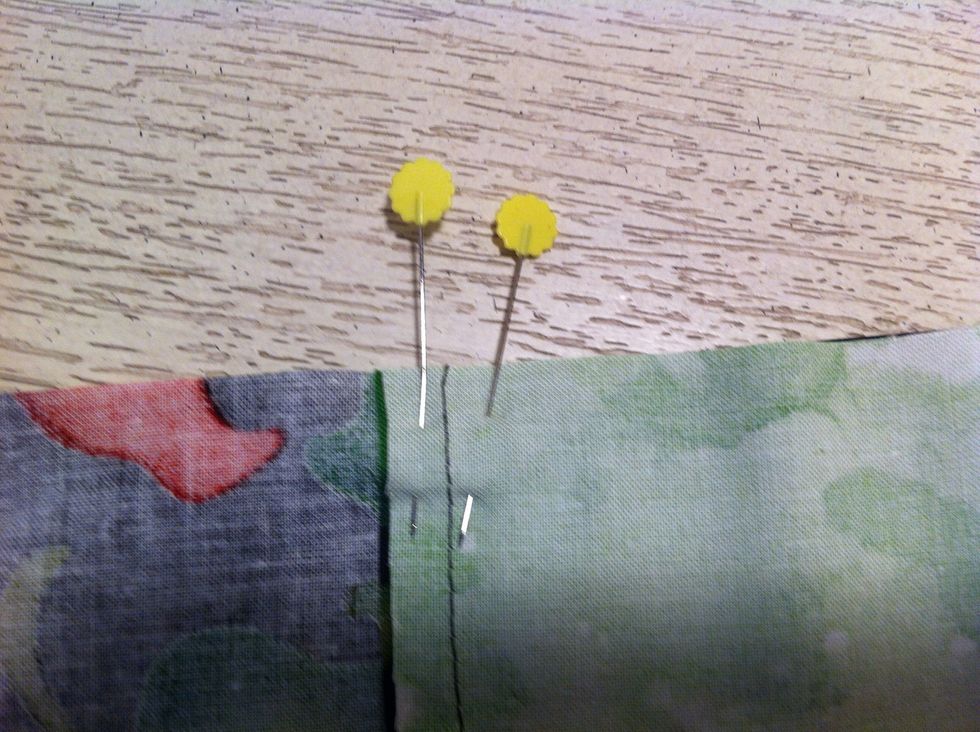 PIN. Place a pin through each side of the seam allowance. (This prevents the seams from shifting when you sew, which gives you perfectly aligned pieces)