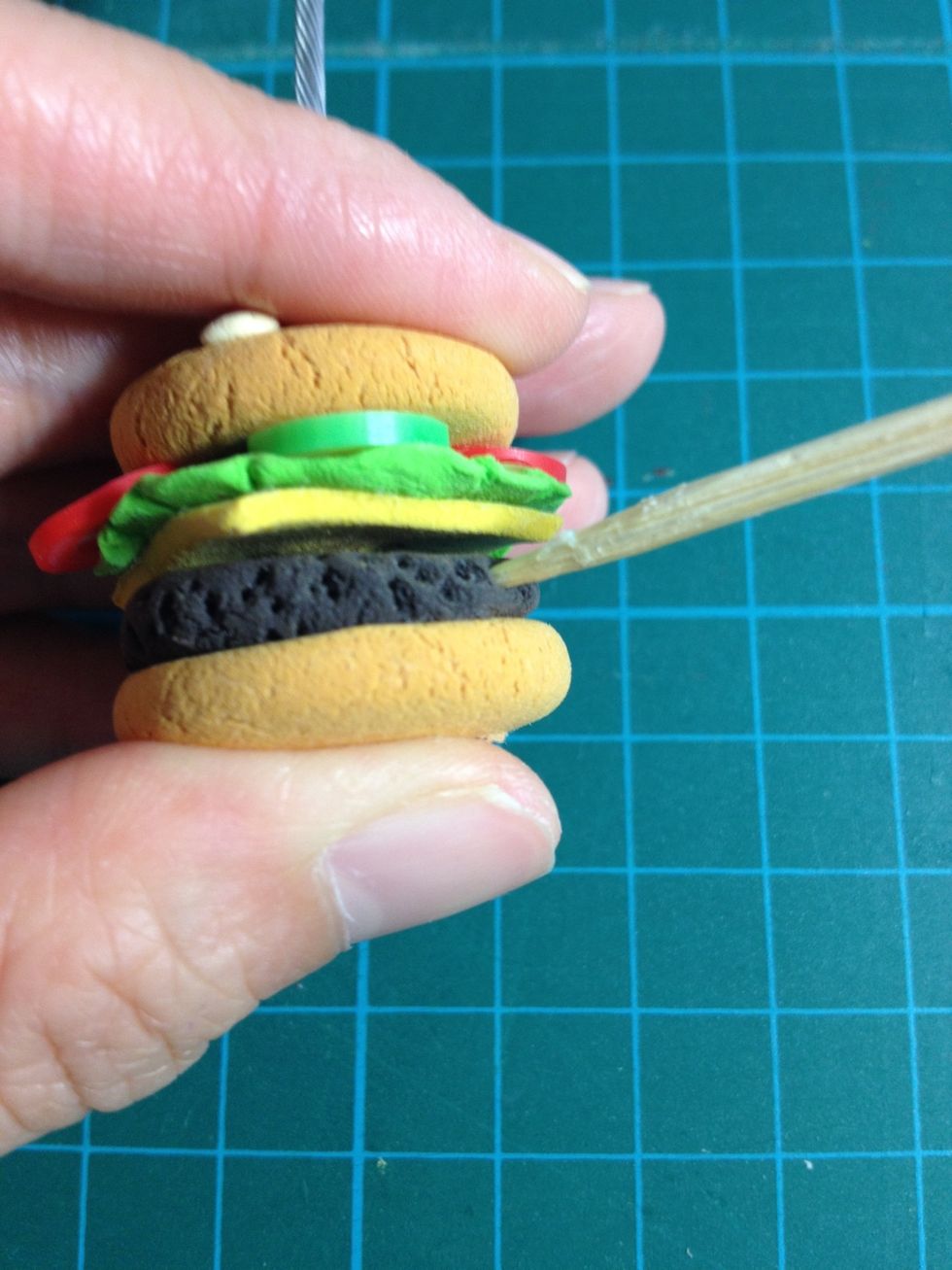 - Pin some holes on the dark brown clay to make it more alike beef.