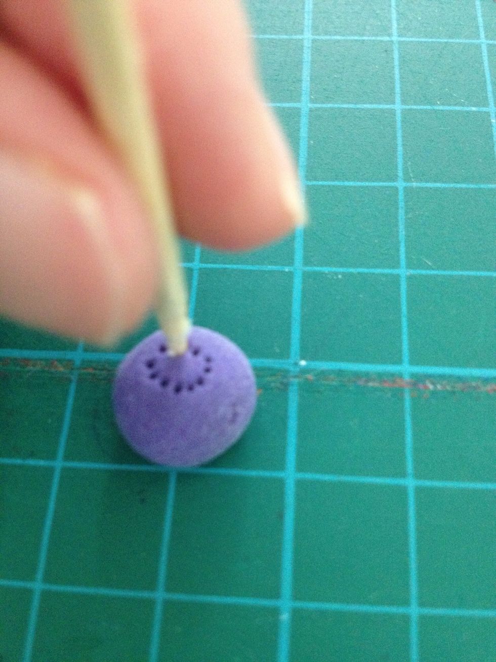 Pin some holes to make it become blueberry.