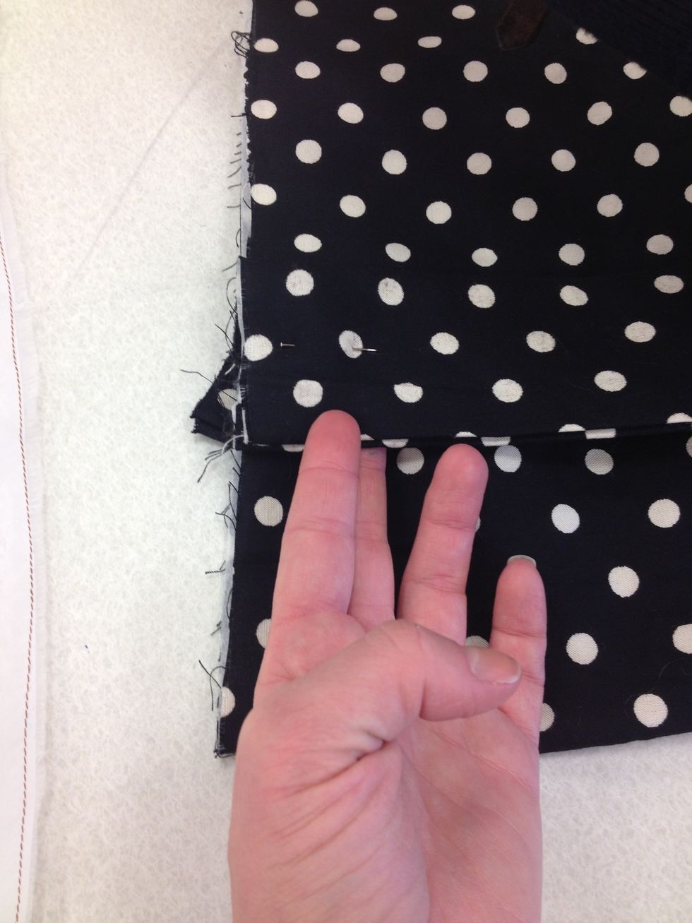 Pin straps to outer fabric with right sides of fabric together. Raw edge of the bag and raw edge of the strap must line up.