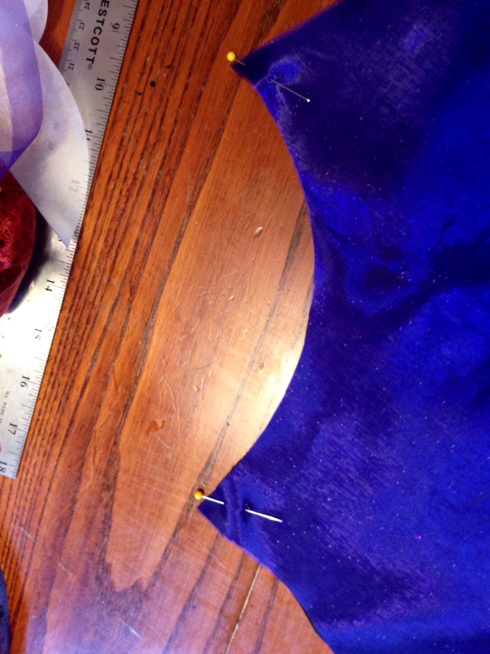 Pin the black fabric and the colored fabric together. I pinned the fabrics together with the sides that would be facing out next to each other.