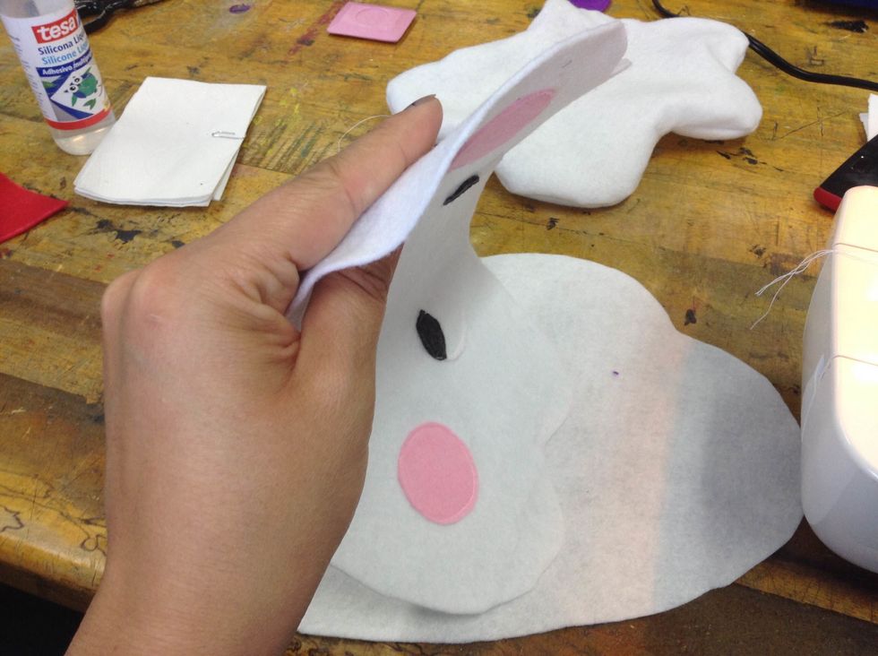 Pin the front and back of the monster\u2019s body with the accessories looking inwards.