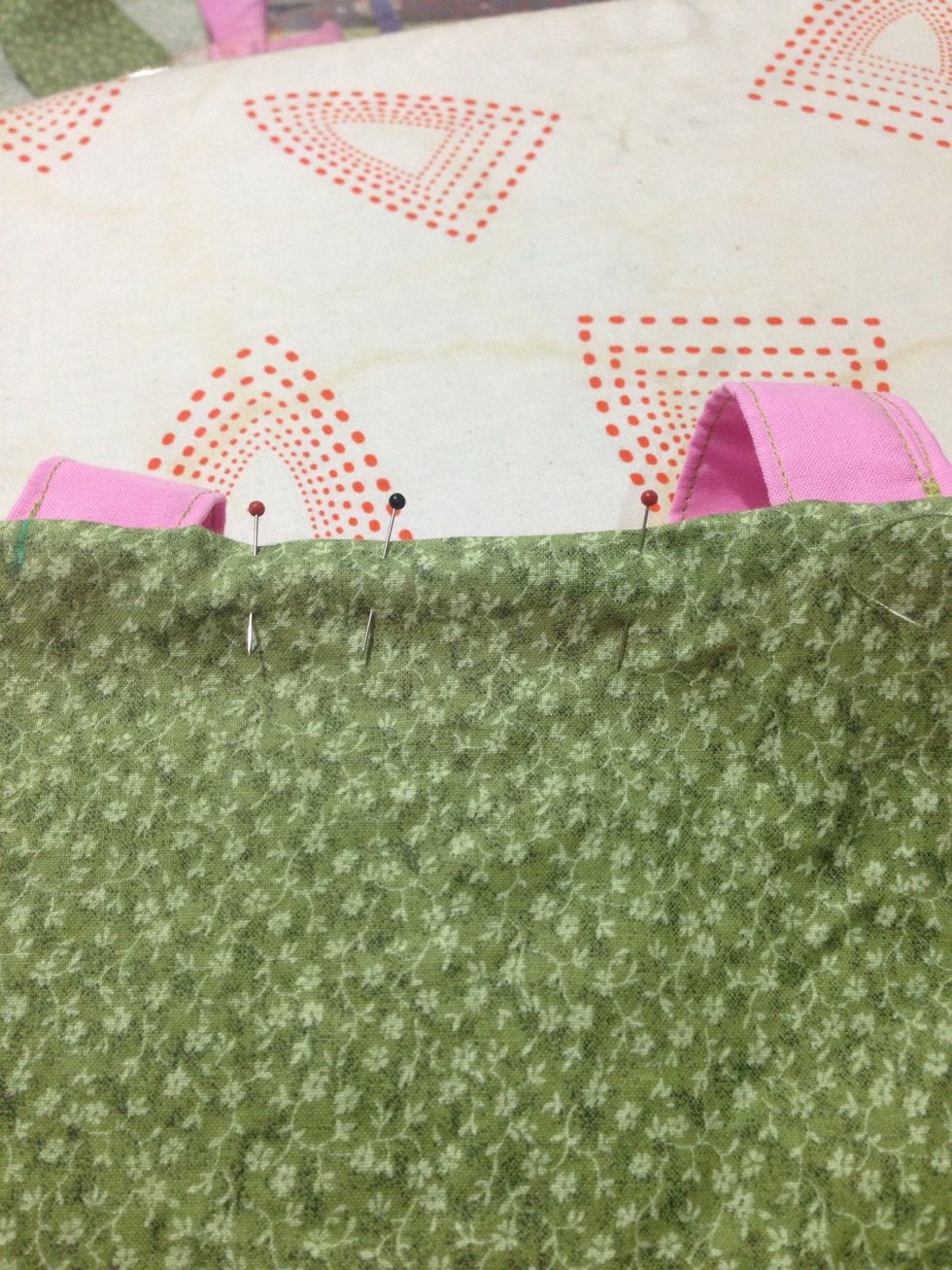 Pin the gap close tucking the raw edges inside.  Lightly press the top of the bag & then sew a narrow seam around the top if the backstitching at the beginning & end.