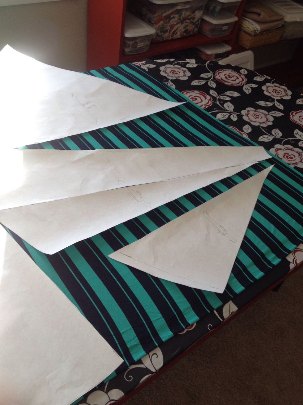 Pin the pattern pieces onto the material.