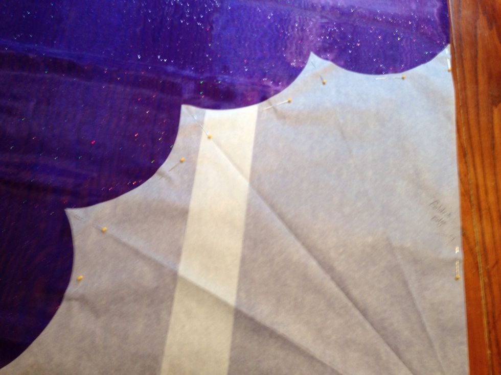 Pin the pattern to the fabric and cut it out.