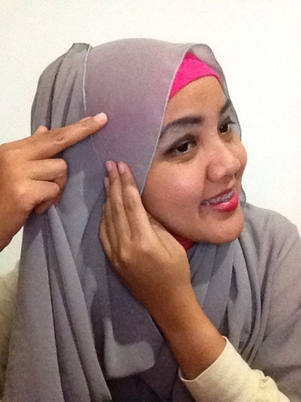 Pin the shawl to secure it